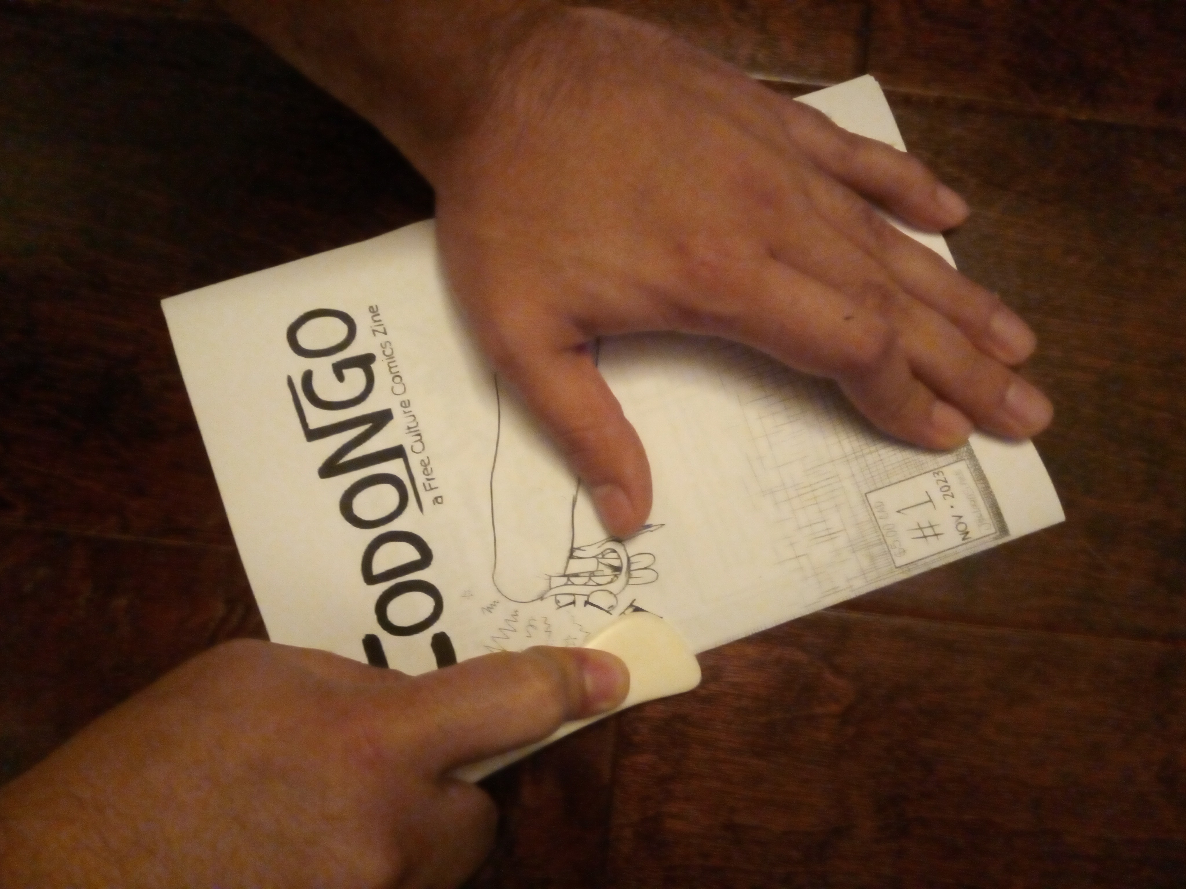 Issue 1 being foded with a bone scorer