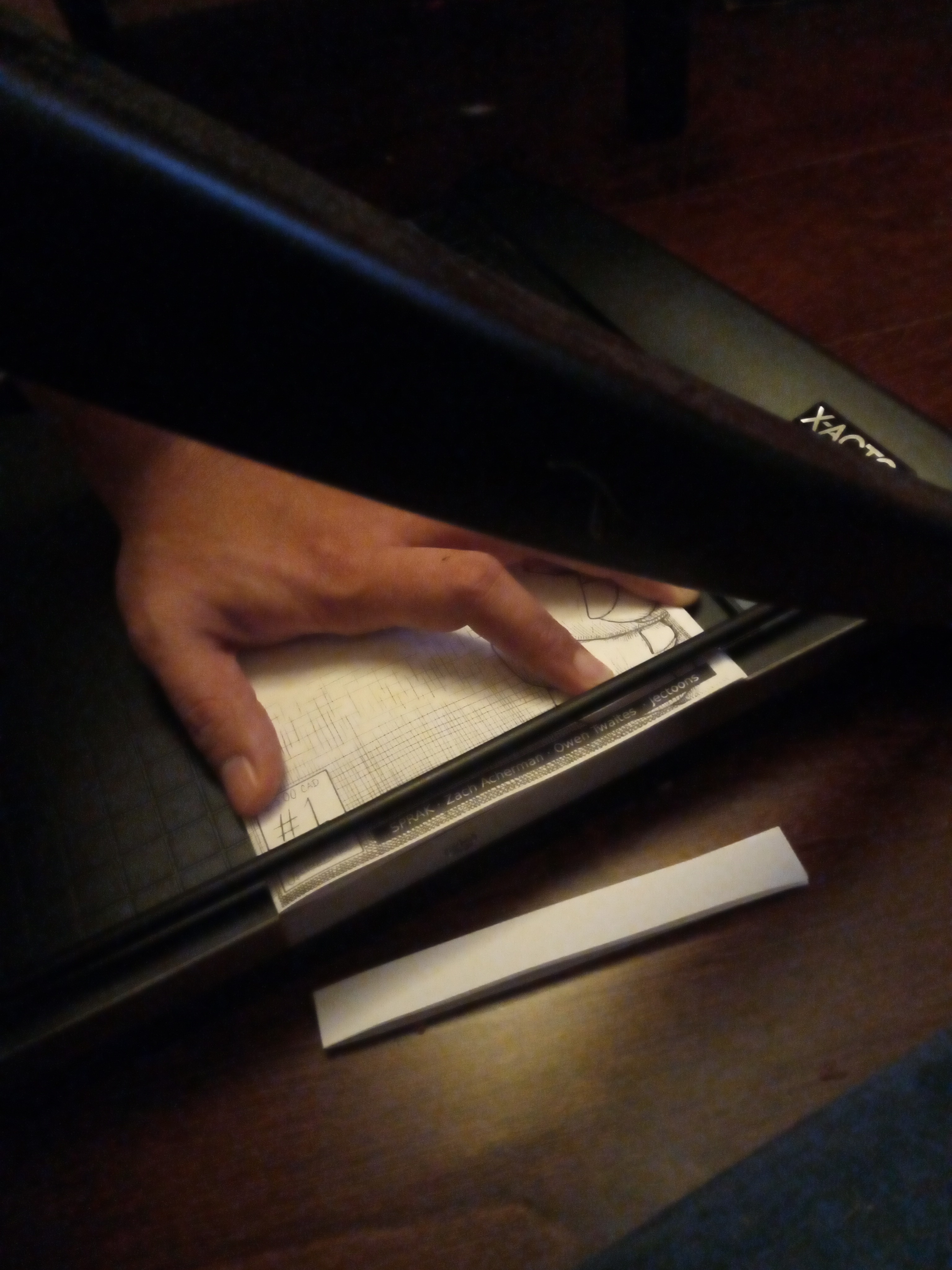 More cutting the zine with Guillotine